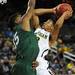 Michigan sophomore Trey Burke looks to shoot around Cleveland State sophomore Anton Grady during the first half of an NIT Season Tip-Off game at Crisler Center on Tuesday. Melanie Maxwell I AnnArbor.com